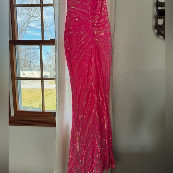 This prom dress is gorgeous! Hot pink…Size 2.. Jovani. - Picture 6 of 9